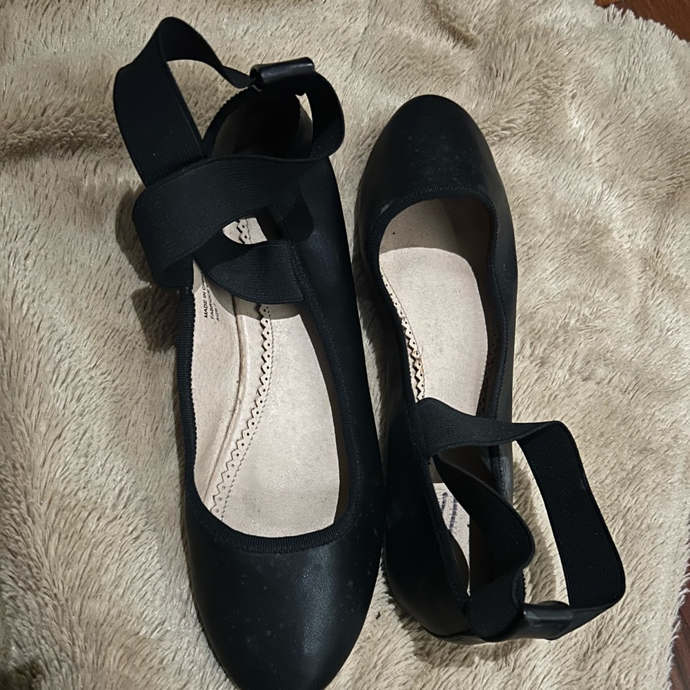 Black ballet style flats with with crossover elastic straps